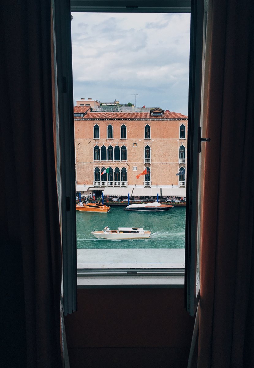 the grand canal in venice through an open window, shot by a campaign creator